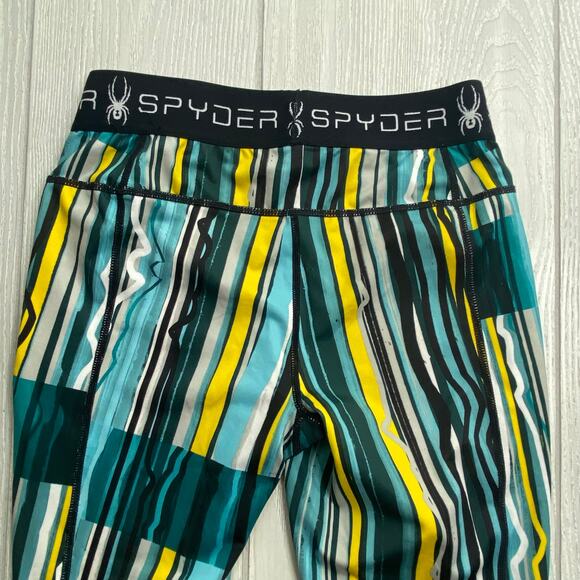 Spyder Blue Green & Yellow Freeze Stripe Print Slash Capri Leggings Size Small - Picture 9 of 11